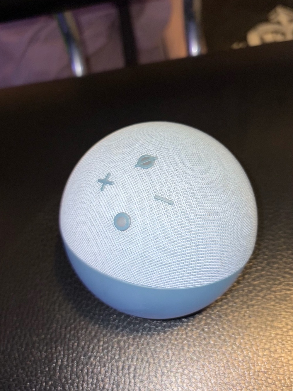 Amazon Echo Dot smart speaker in light blue